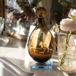 Madame De La Maison Live Bulbous Amber Bottle With Square Blue Base